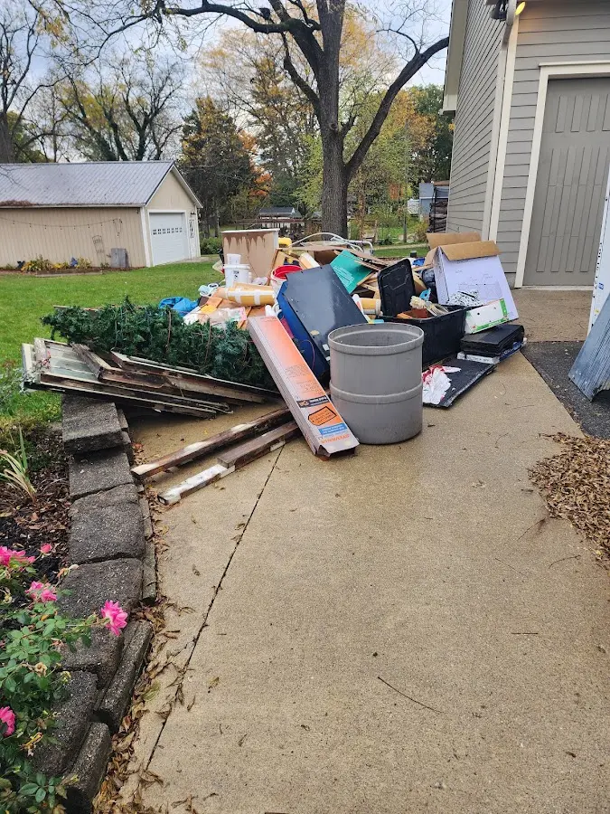 Dumpster being loaded with debris for Demolition Dumpster Rental in Southampton